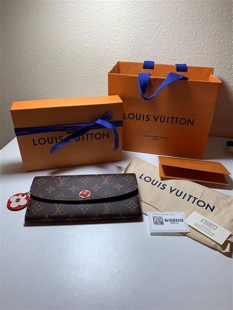 louis vuitton emilie wallet date code location|louis vuitton black empreinte wallet.